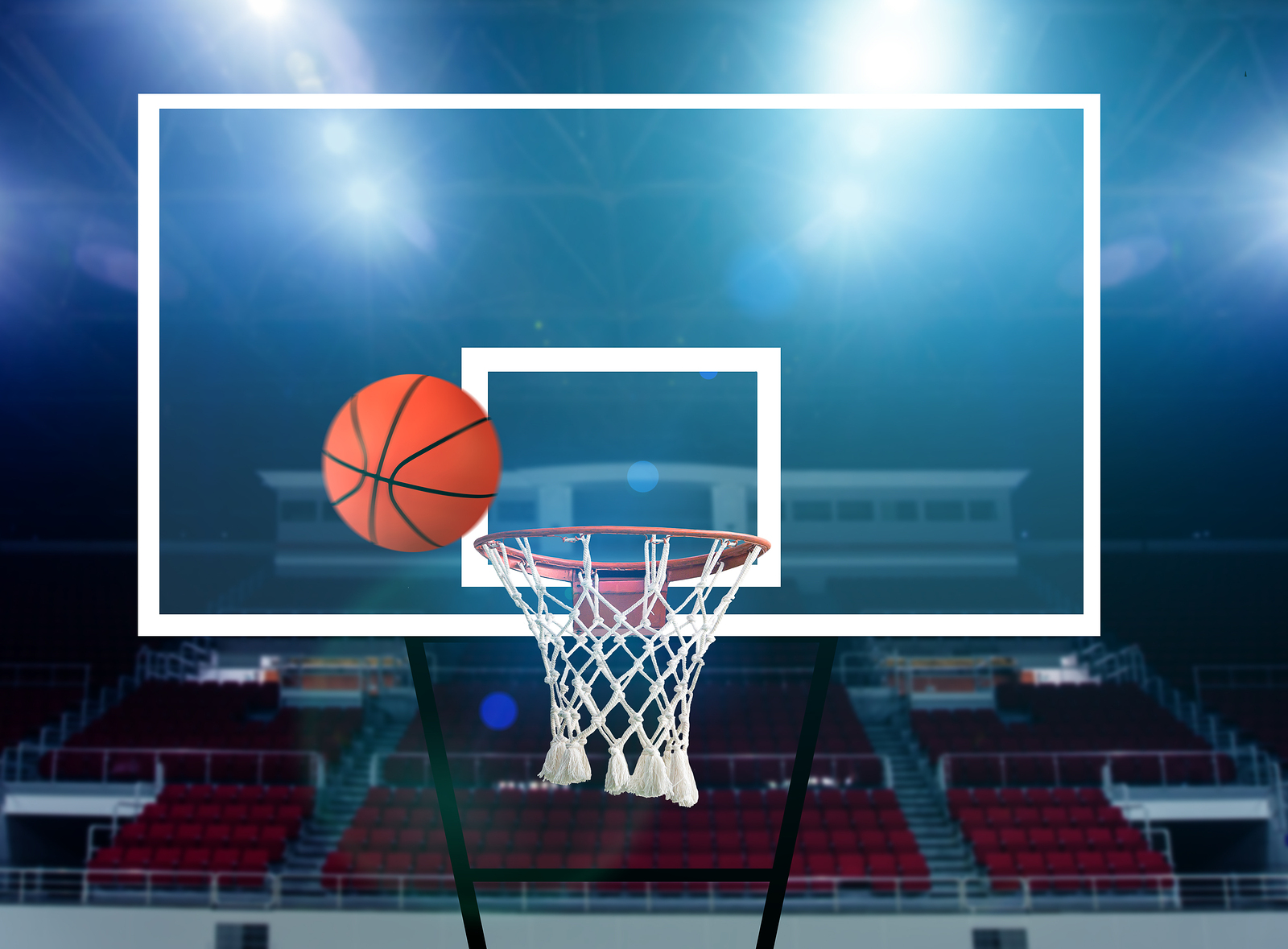 Glass basketball board and hoop with a missed shot